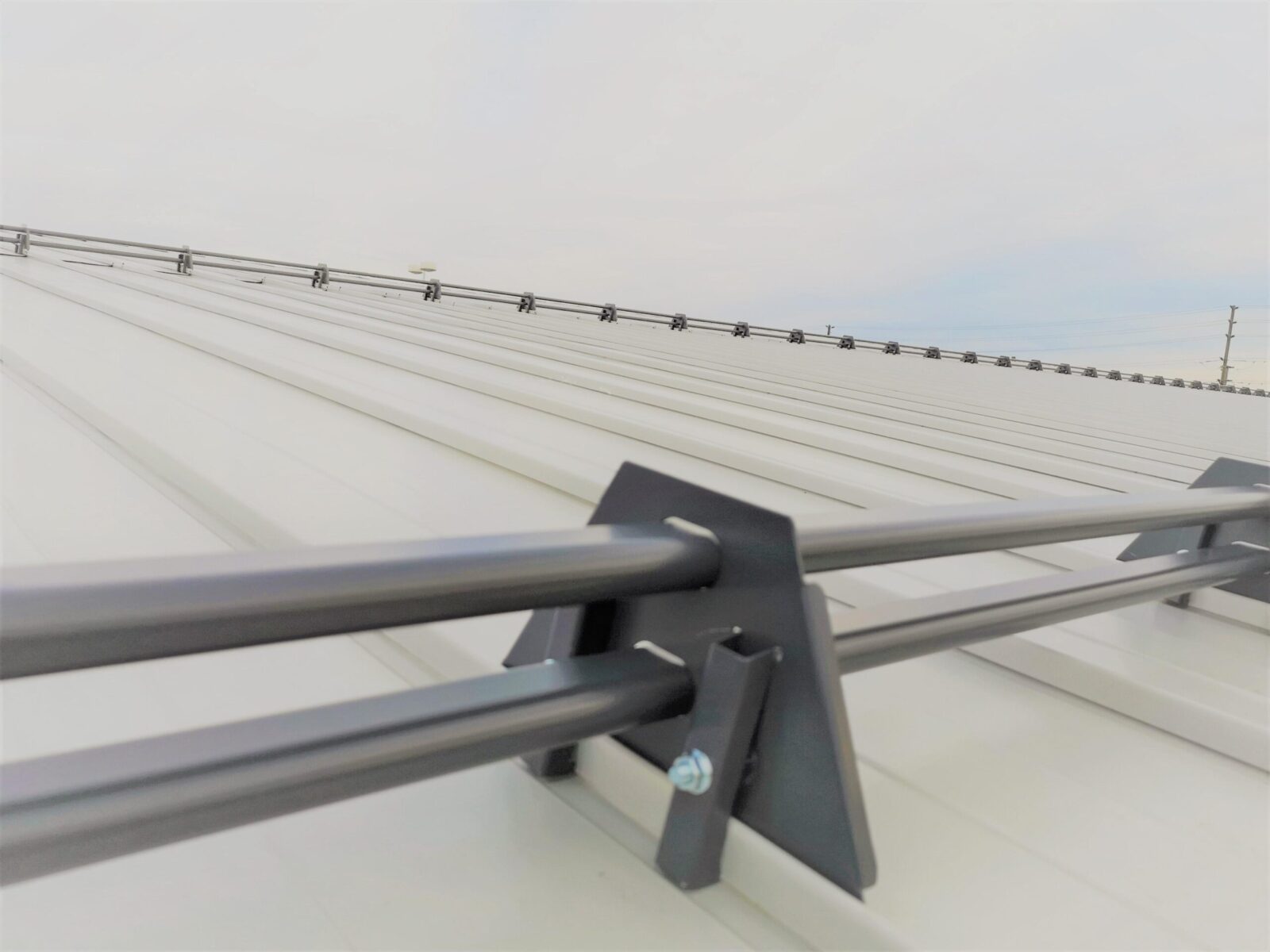 Install Tubular Snow guards on Standing Seam Metal Roof in North America