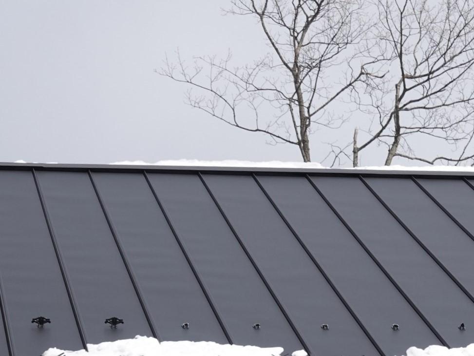 Image showing a roof with a cleat snow guard system with some cleats broken